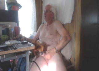 Pet interacts with an elderly manтАЩs hard-on